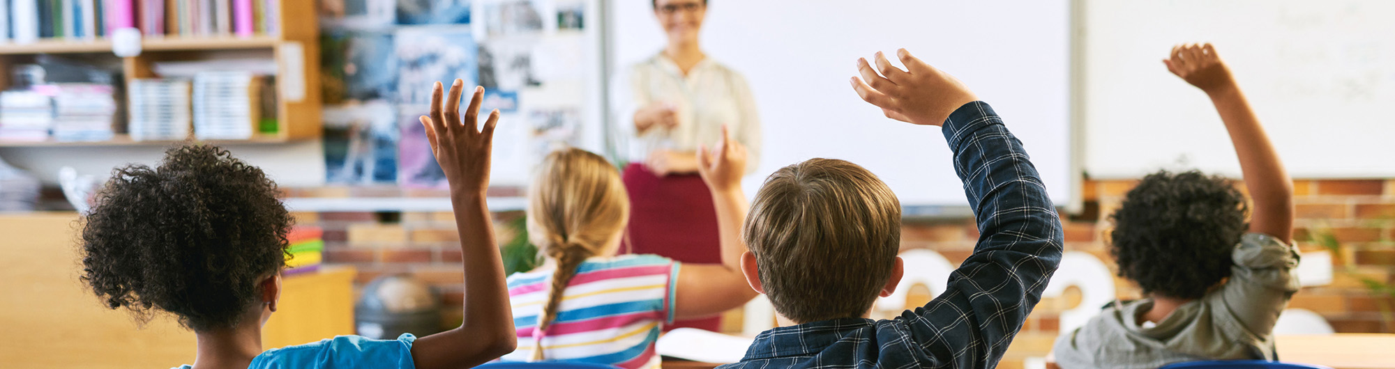 teacher in a classroom with students